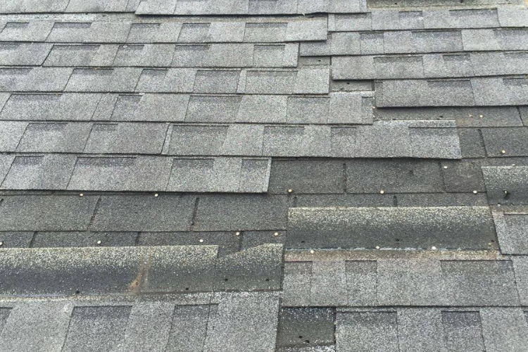 Damaged roof needing Auburn roof repair for better insulation